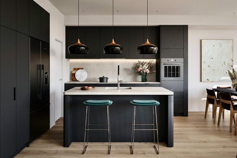 An image picturing a modern kitchen with black countertops